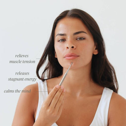 In-Action Image of Daily Habits Facial Reflexology Wand from Wellaine - Promoting Balanced Skin Complexion, Relieve Muscle Tension, Calm the Mind and Improve Overall Wellness