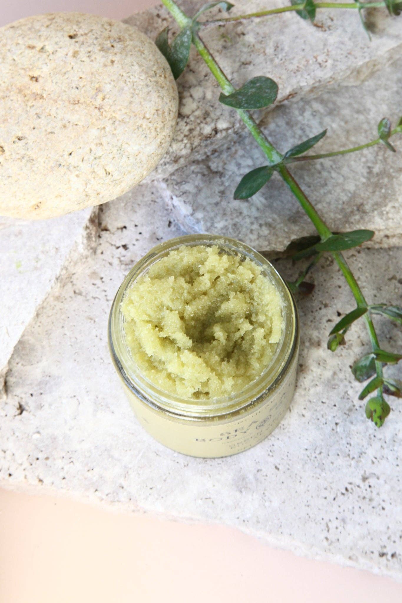 Top view of Circular Living Sea Salt Body Scrub showing green tea exfoliating texture, natural skincare.