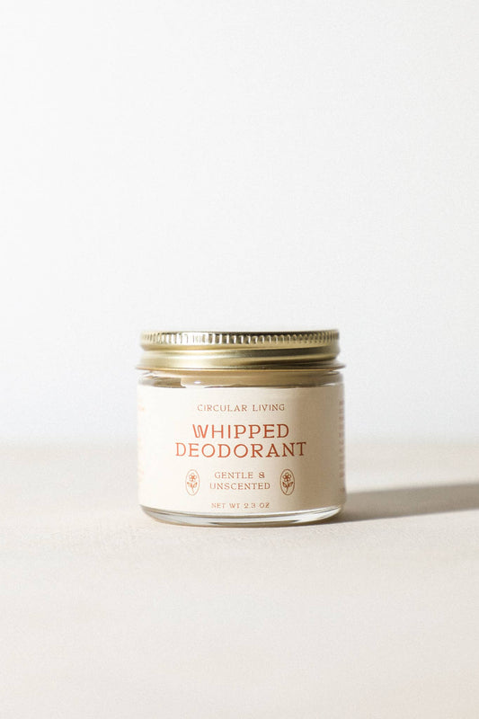 Circular Living Whipped Deodorant Gentle Unscented shown in glass jar on neutral background.