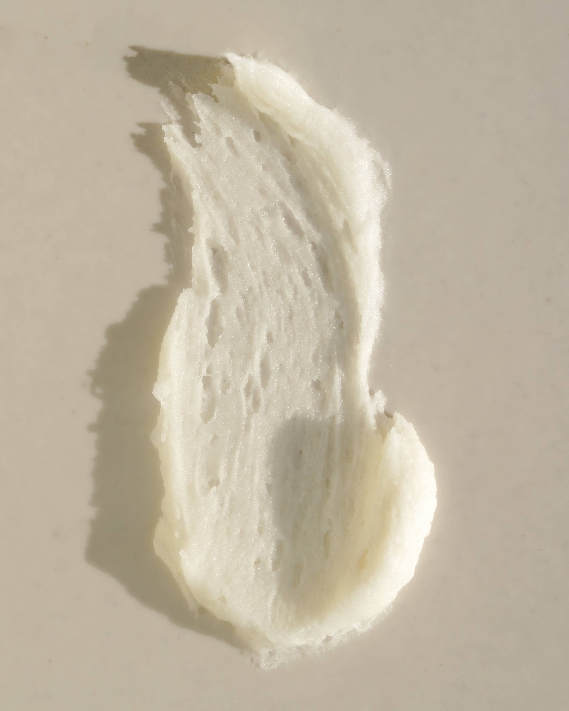 Texture close-up of Circular Living Whipped Deodorant Gentle Unscented, natural personal care product.