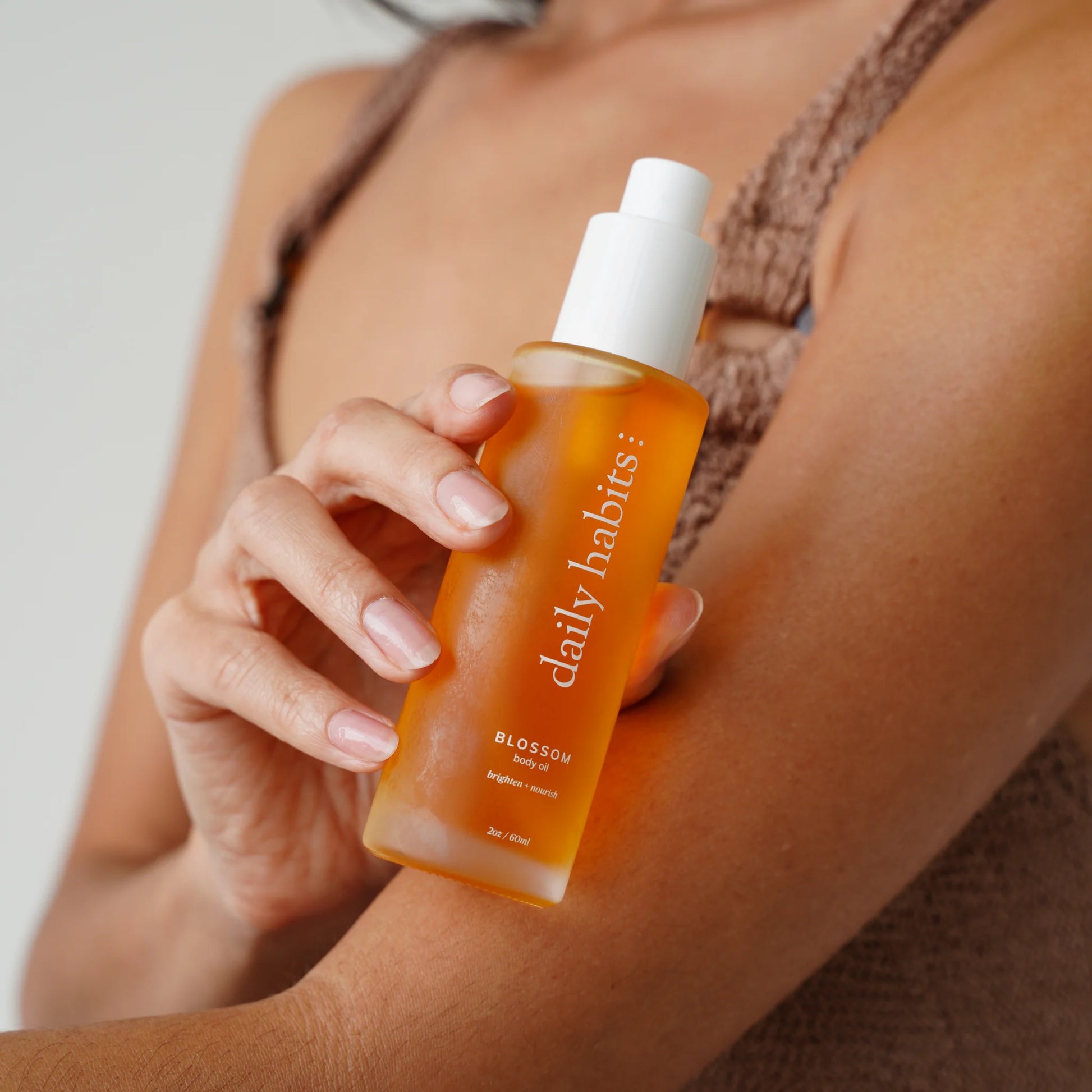 Close-up of Daily Habits Blossom Body Oil for brightening and hydrating body care