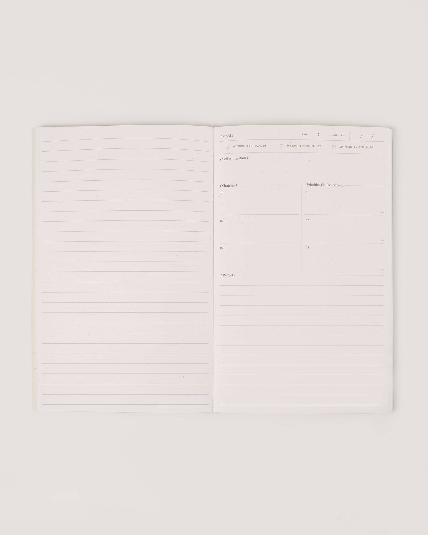 Lined journaling pages inside Wilde House Paper Night Routine Journal.