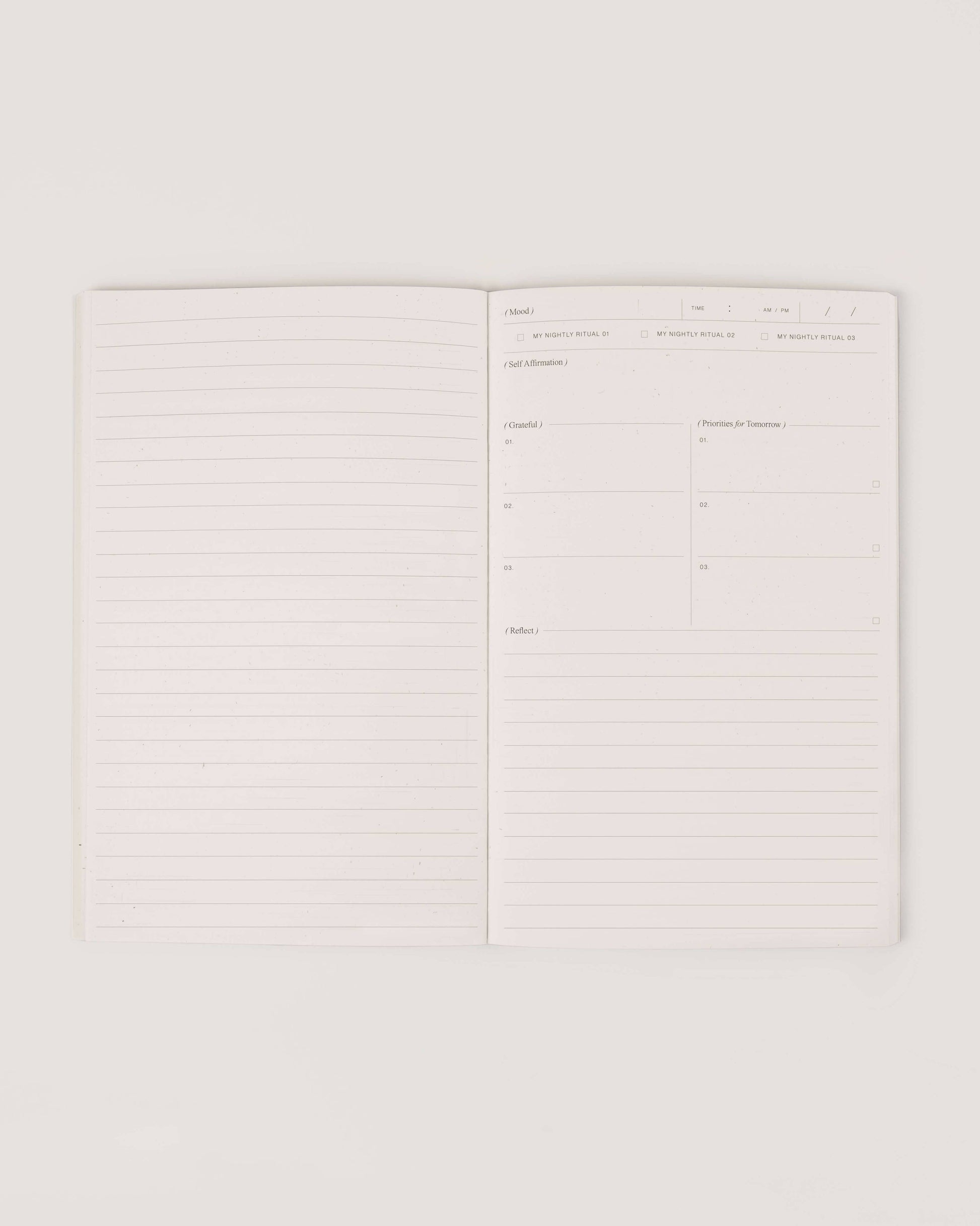 Lined journaling pages inside Wilde House Paper Night Routine Journal.