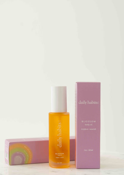Organic Blossom Body Oil in elegant packaging, featuring Daily Habits’ nourishing formula.