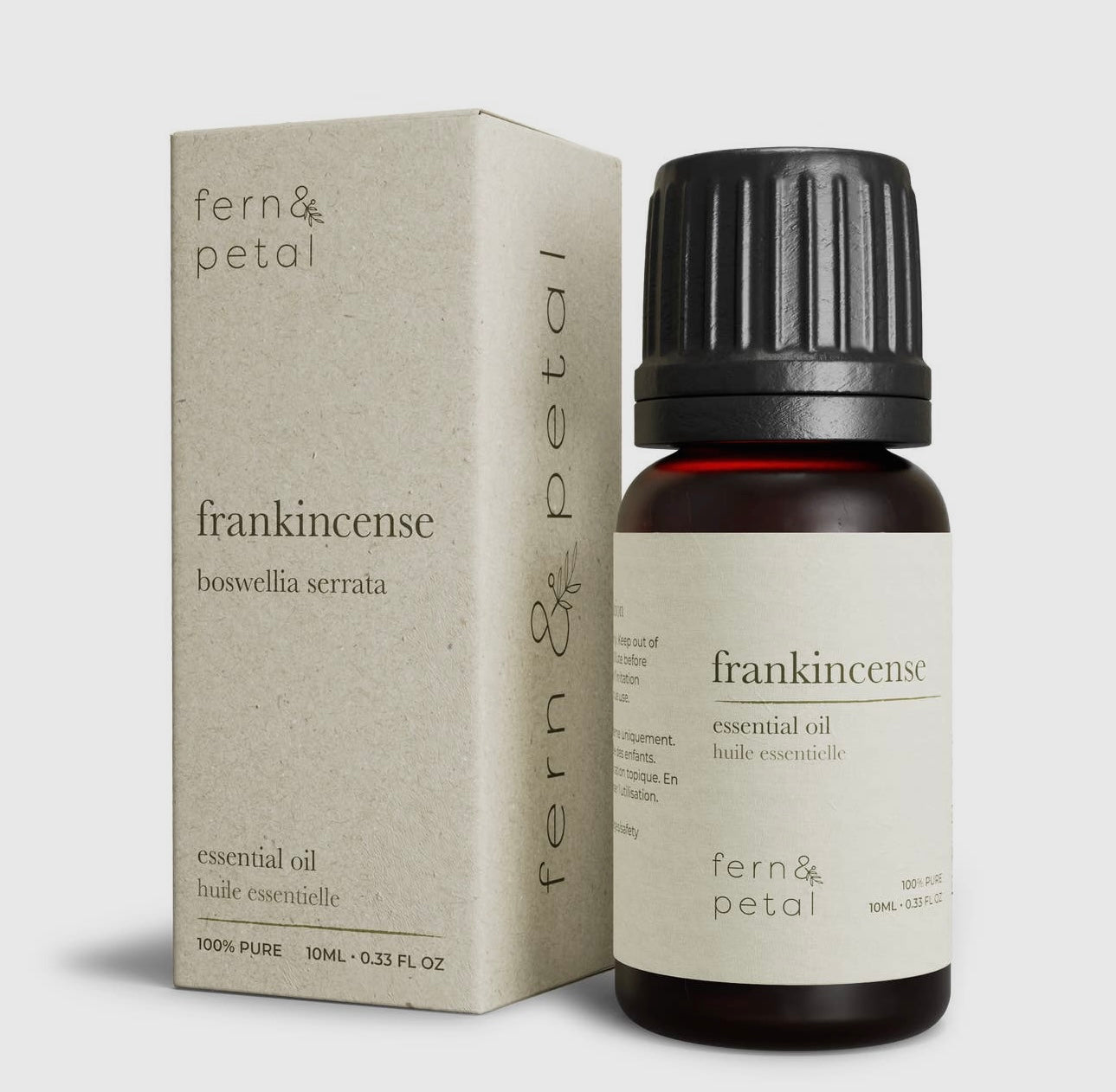 Fern & Petal Frankincense Essential Oil bottle and box set against a clean white background.