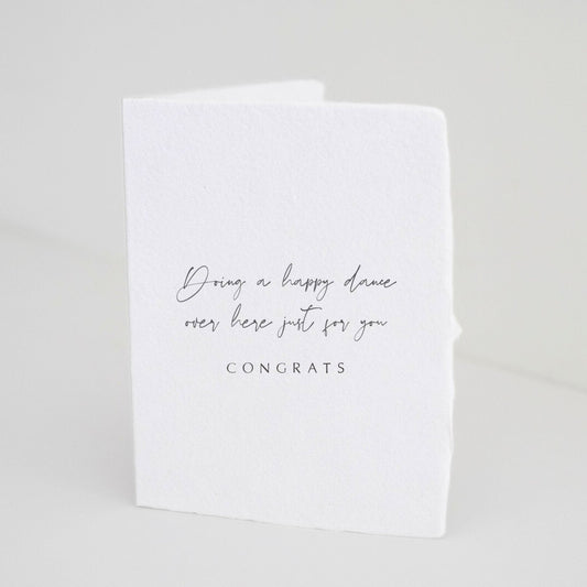 Front of Paper Baristas greeting card with message “Doing A Happy Dance Over Here Just For You CONGRATS”