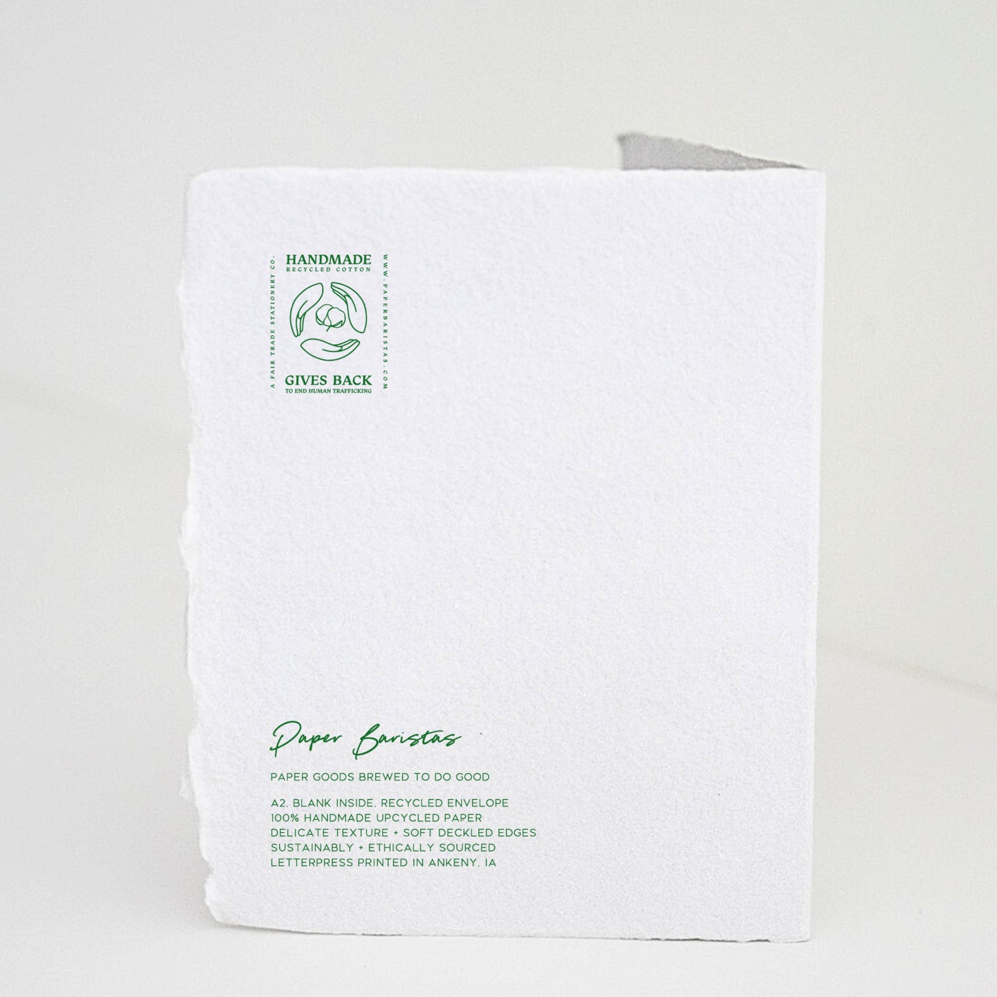 Back of Paper Baristas "Mother, Thank You For All The Ways You Helped Me Bloom" greeting card with letterpress details and ethical production message in green ink.