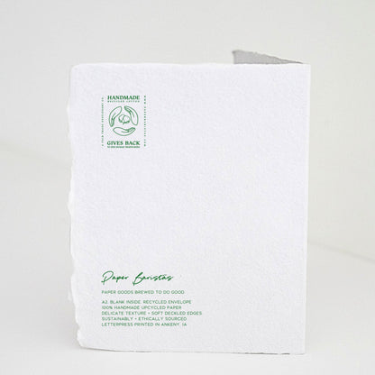 Back of Paper Baristas "Mother, Thank You For All The Ways You Helped Me Bloom" greeting card with letterpress details and ethical production message in green ink.