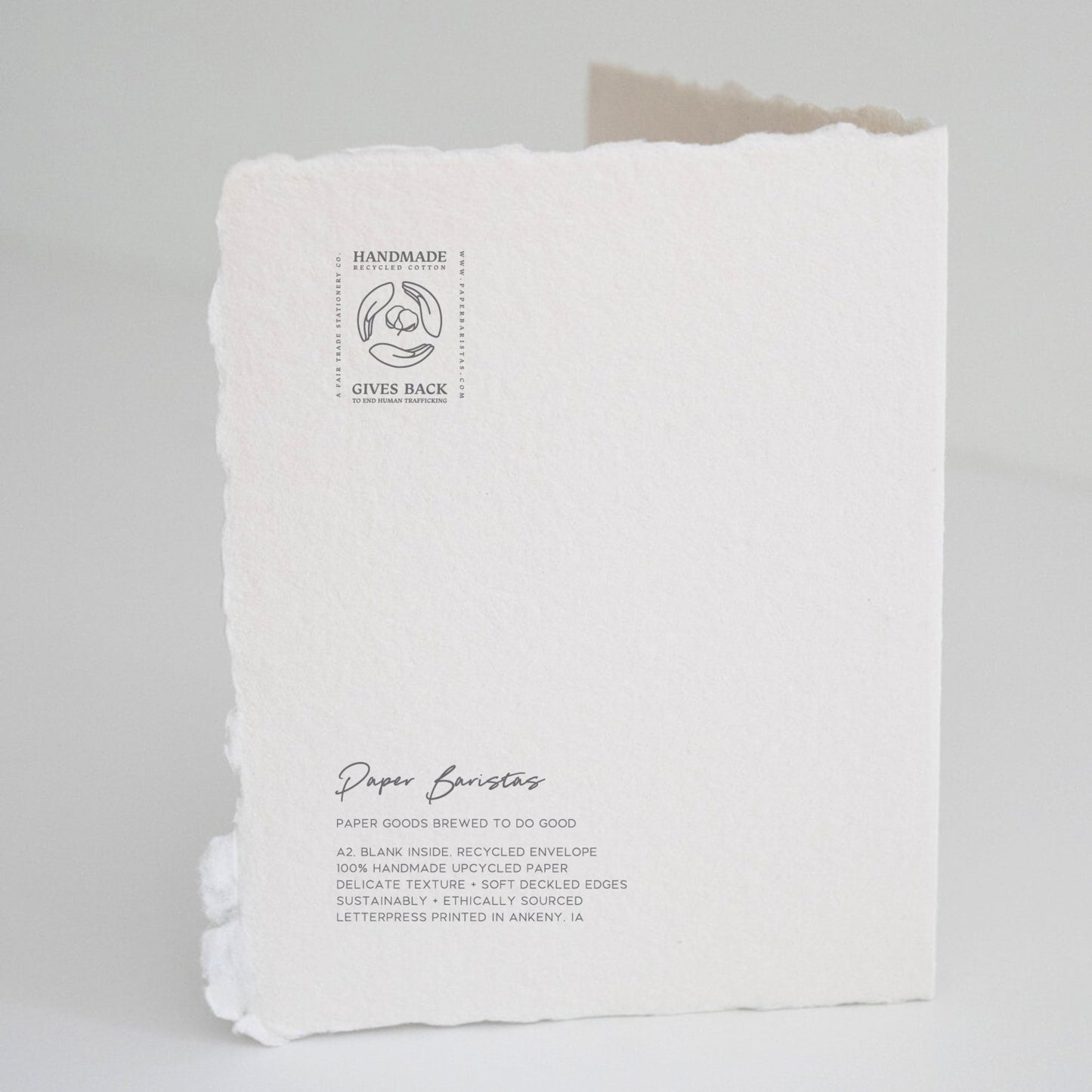 Back of Paper Baristas "You Two Make The Perfect Blend, Congrats On The New Baby" greeting card with letterpress details and ethical production message.