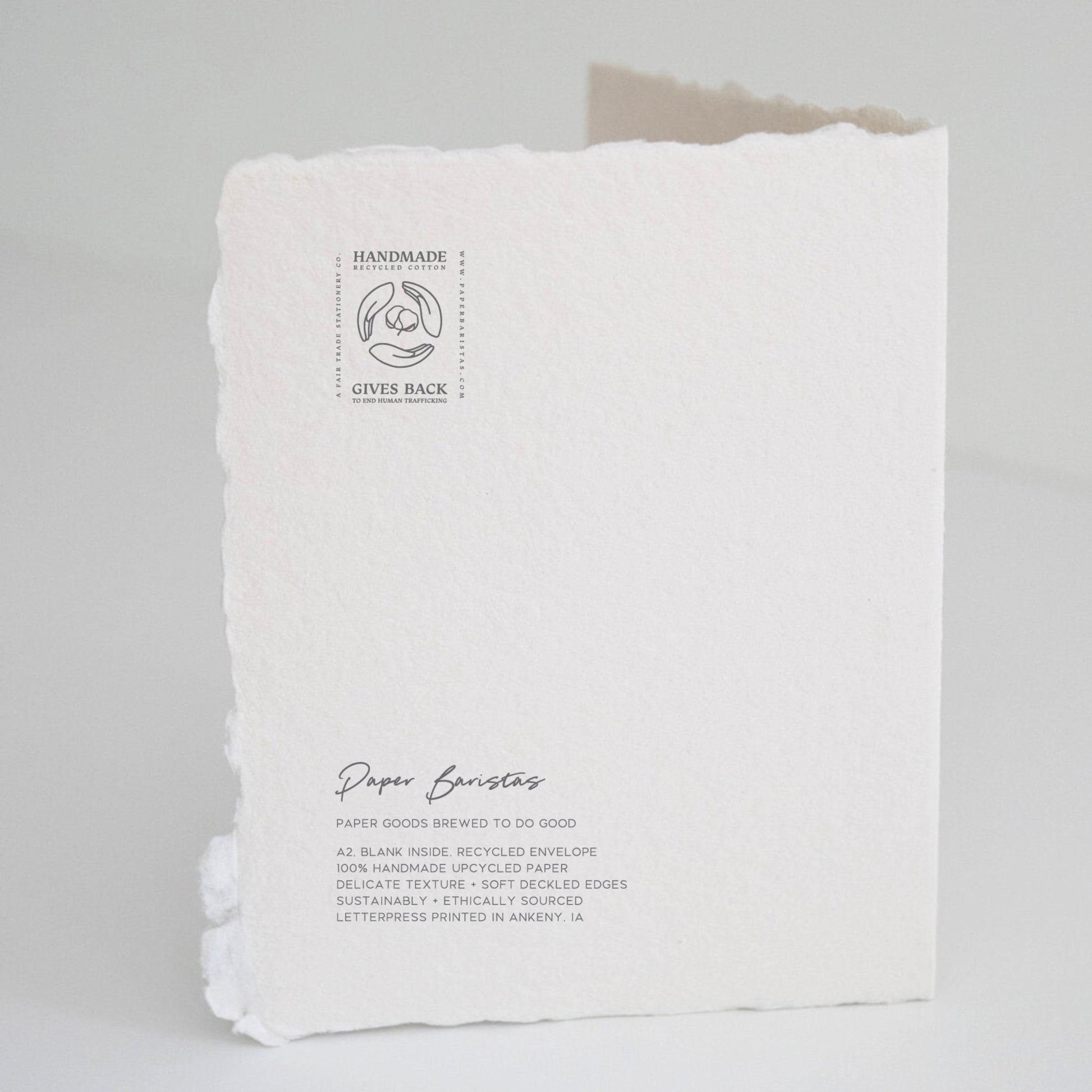 Back of Paper Baristas "You Two Make The Perfect Blend, Congrats On The New Baby" greeting card with letterpress details and ethical production message.