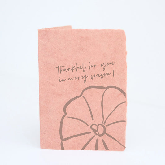 Front of Paper Baristas card with pumpkin illustration and “Thankful For You In Every Season” text on blush paper.