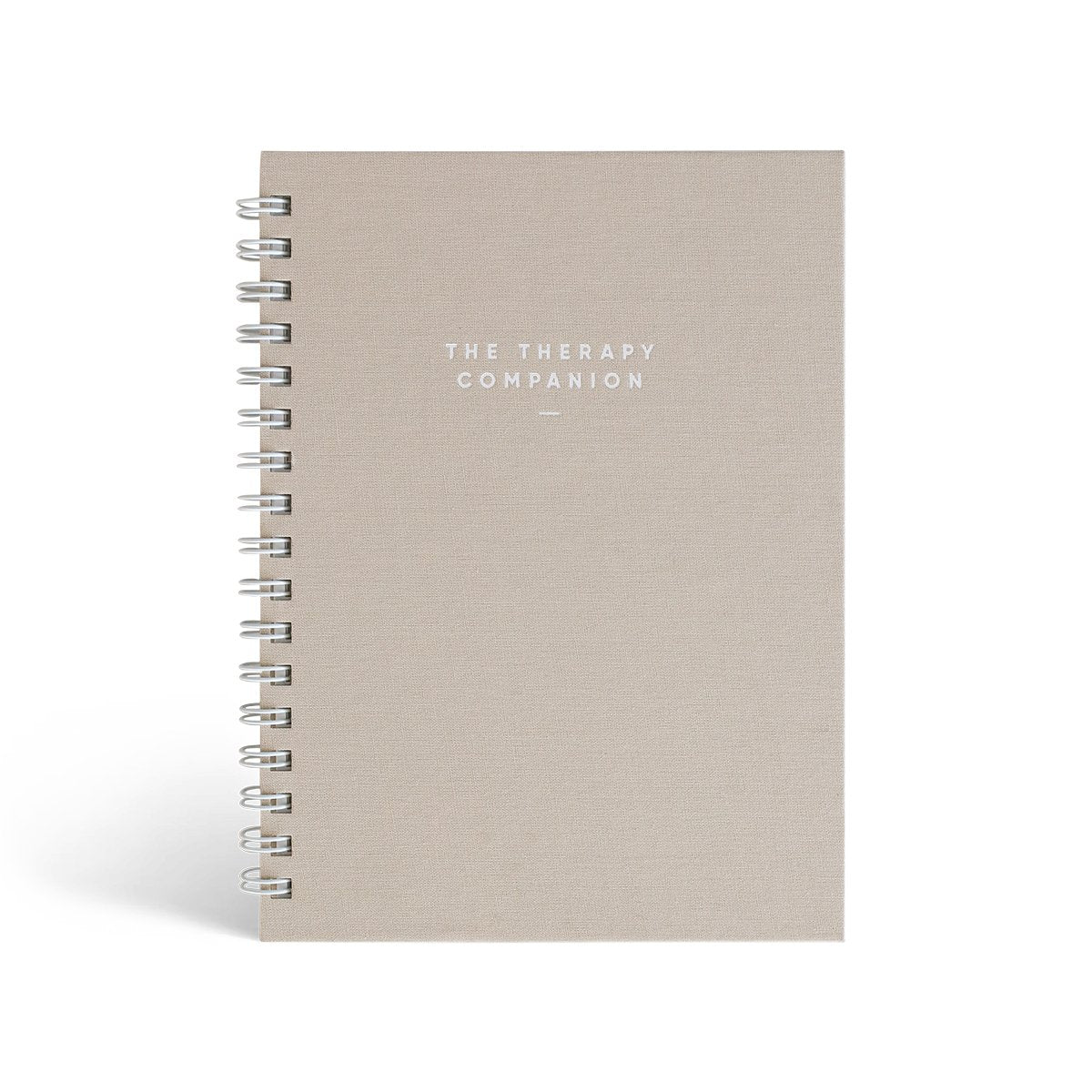 The Therapy Companion journal by Simple Self Co with sand linen cover, spiral bound.