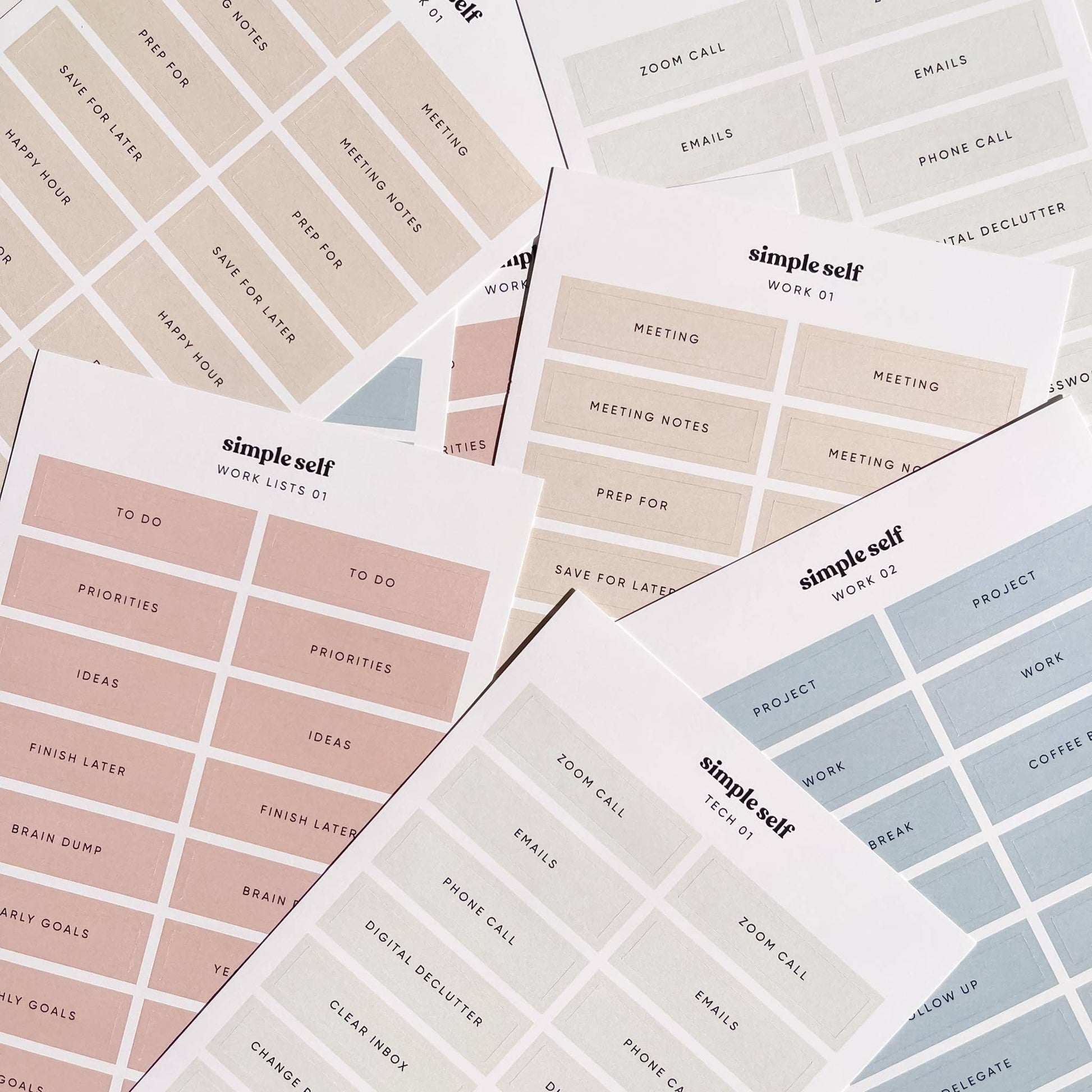 Variety of Work Sticker Set sheets by Simple Self Co, with productivity labels in beige, blush, and blue tones.