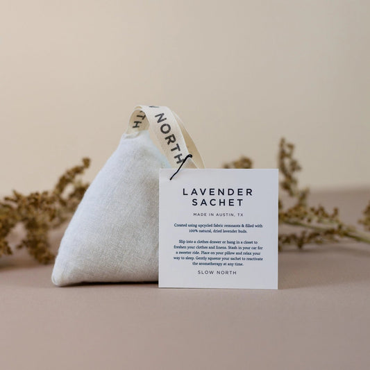 A Slow North Lavender Sachet displayed upright with its product information card in front, labeled as a best seller.
