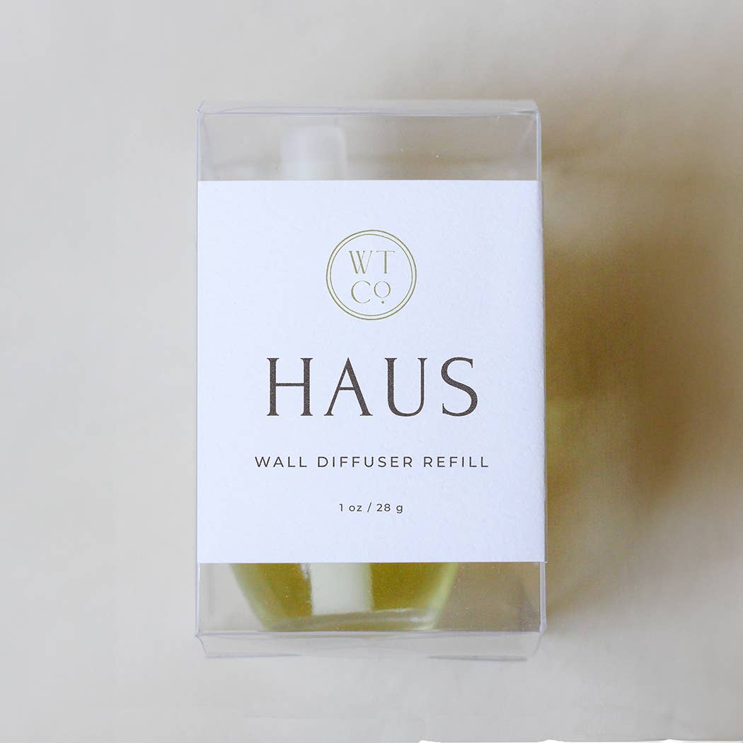 Close-up of Well-Taylored Haus Wall Diffuser Refill in packaging.