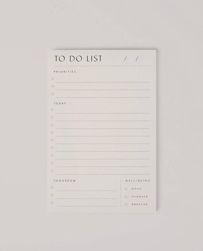 Flatlay of the Wilde House Paper To Do List Pad showing clean minimal lines with  priorities points and wellbeing checkboxes.