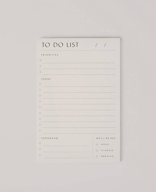 Flatlay of the Wilde House Paper To Do List Pad showing clean minimal lines with  priorities points and wellbeing checkboxes.